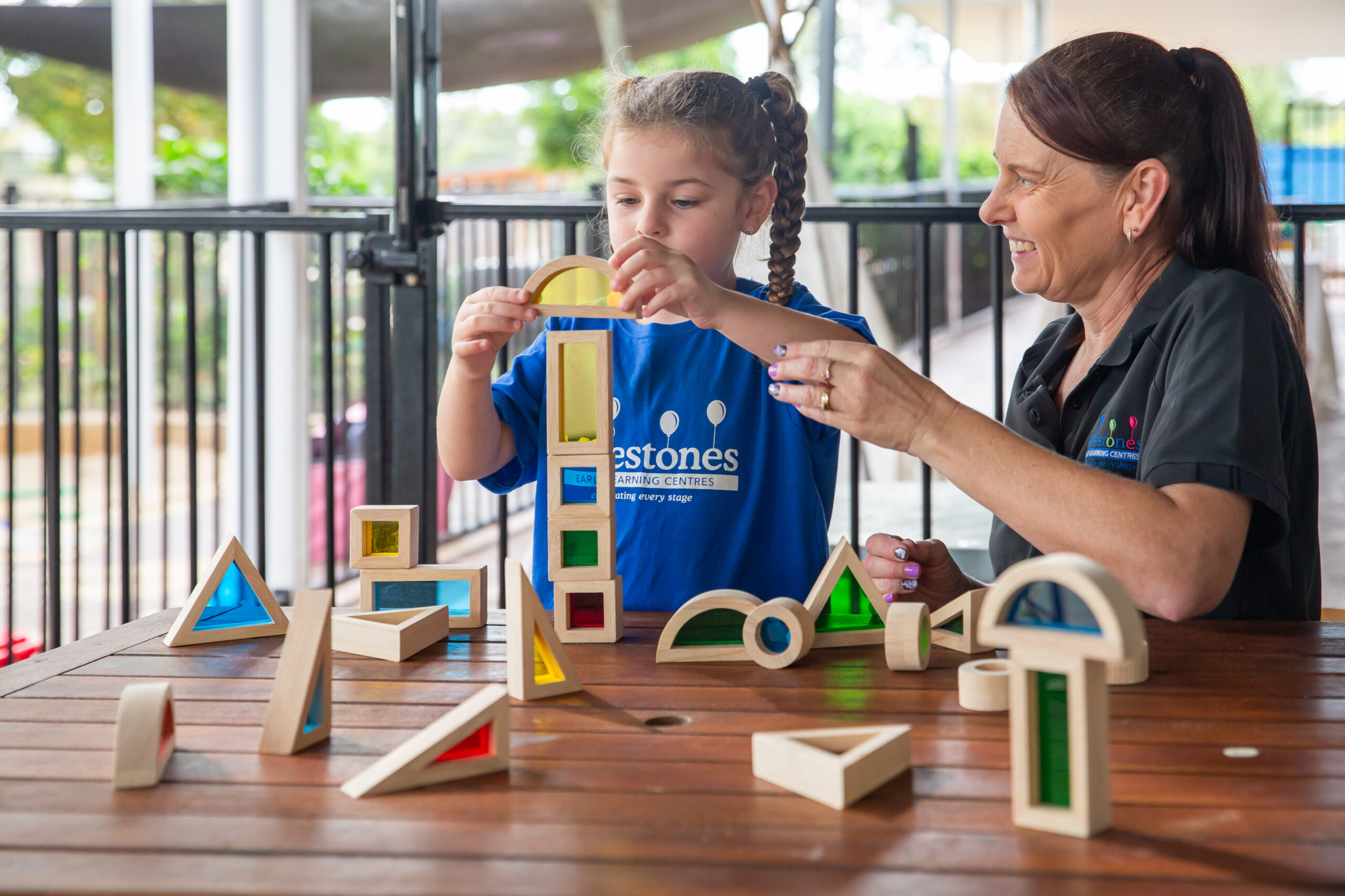 Milestones Toronto | Early Education & Child Care in Toronto | Child and educator enjoy play time at Milestones Toronto